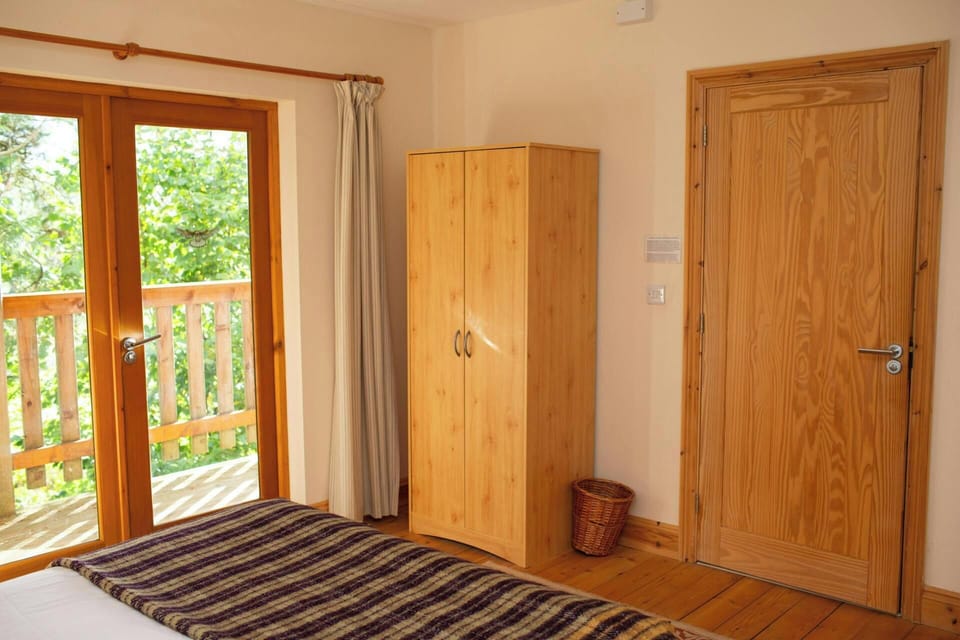 King size bedroom with a double wardrobe