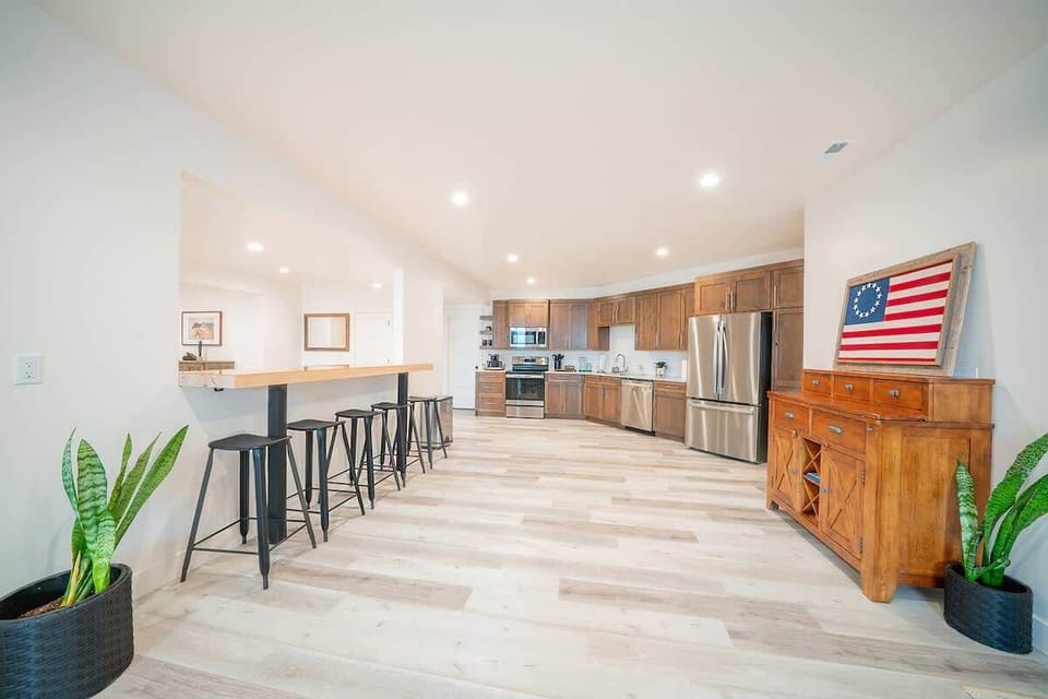 Extra bar seating in kitchen over looking into the family room.