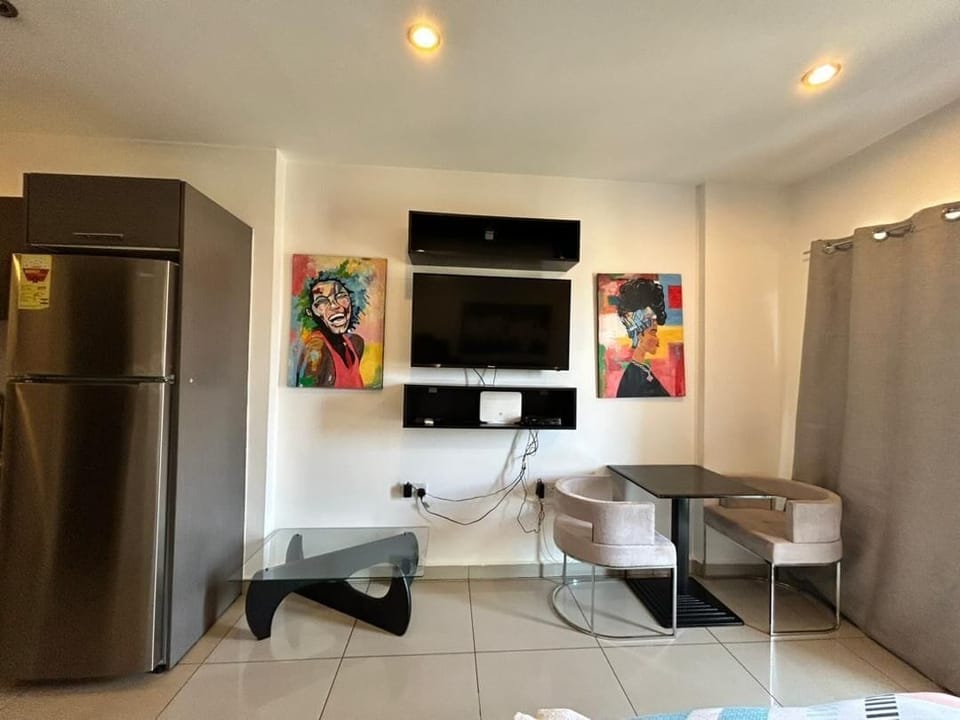 Luxury Apartment, Balcony, City View | Desk, laptop workspace, blackout drapes, soundproofing