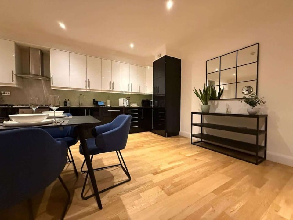 A sleek, fully equipped kitchen with everything you need to prepare delicious home-cooked meals, from quick breakfasts to family dinners