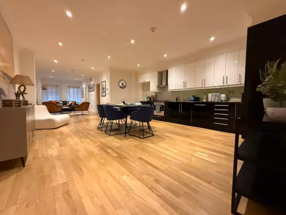 The heart of the home—a stylish open-plan kitchen and dining area, thoughtfully designed for cooking, sharing meals and creating lasting memories together