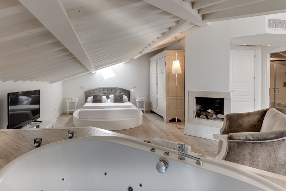 Premium bedding, down comforters, pillowtop beds, minibar