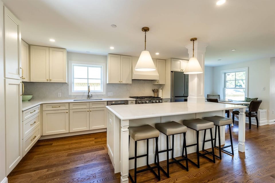 Once you've parked on the driveway behind the home, enter into the new chef's kitchen.