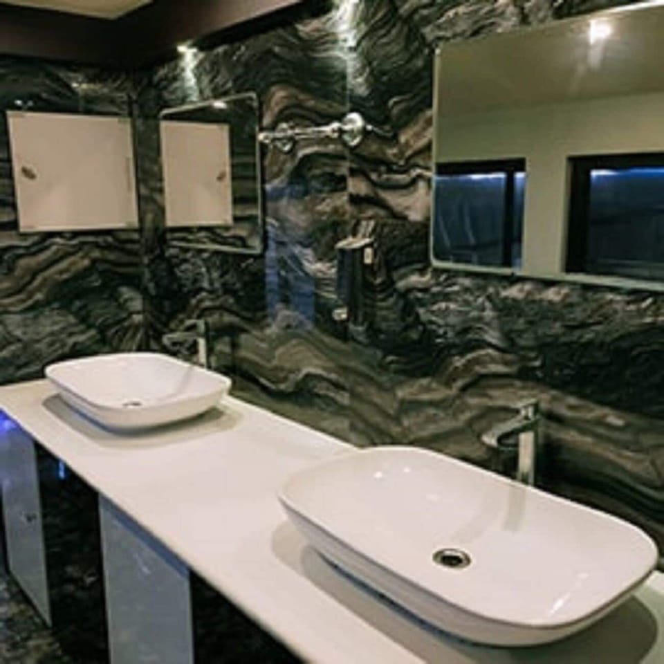 Rainfall showerhead, designer toiletries, bathrobes, bidet