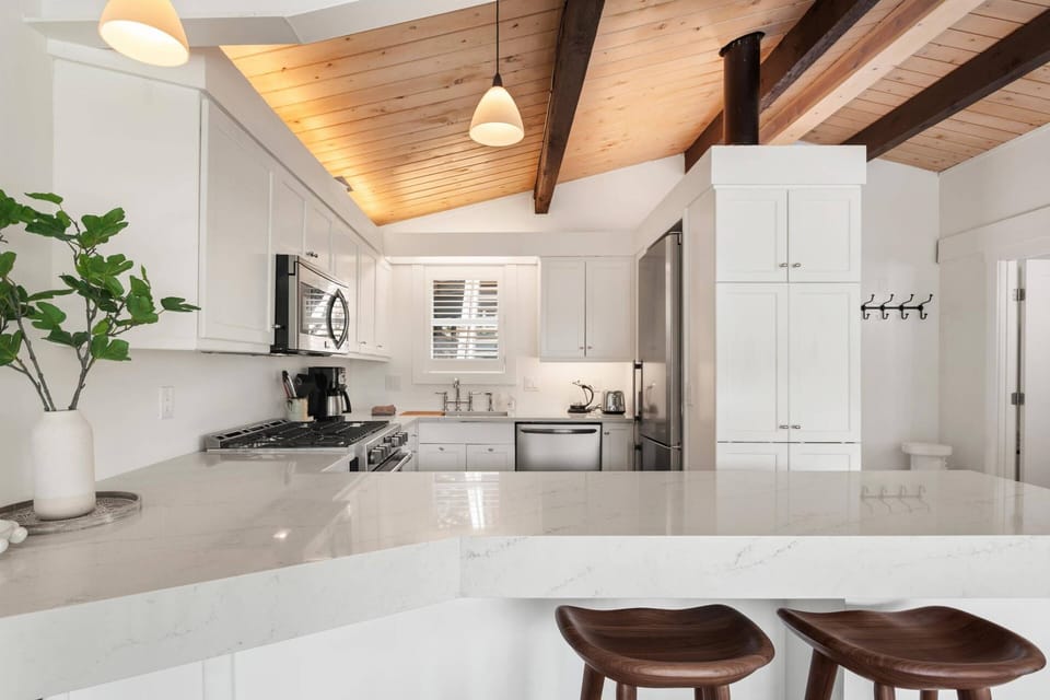 Beautiful new countertops and plenty of storage are great features of this modern kitchen