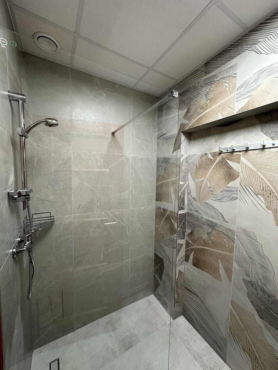 Shower, towels, soap, toilet paper