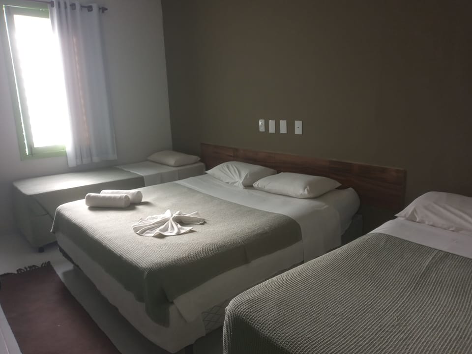Quadruple Room | Minibar, in-room safe, desk, laptop workspace