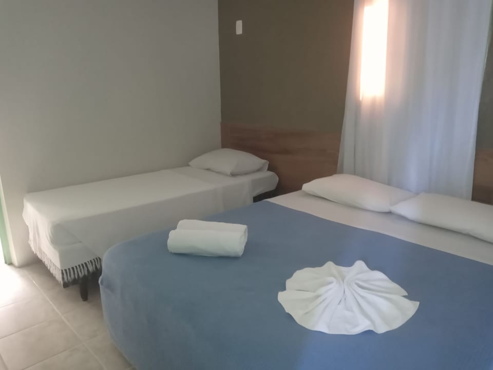 Triple Room | Minibar, in-room safe, desk, laptop workspace