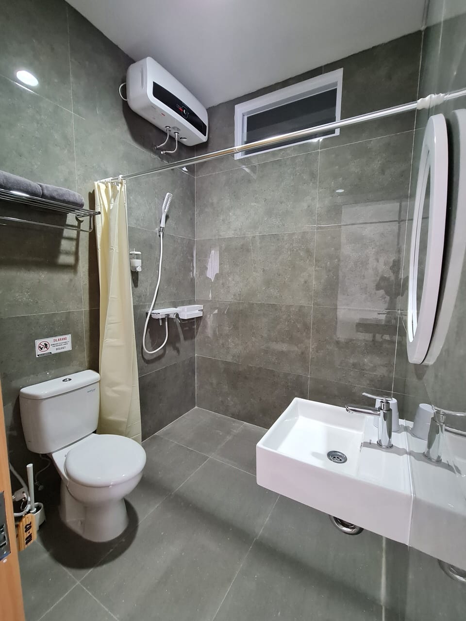 Shower, towels, soap, toilet paper
