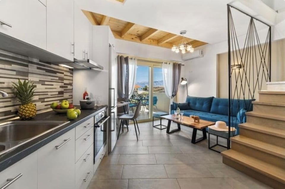 Deluxe Apartment, Sea View | Private kitchen | Full-size fridge, oven, stovetop, electric kettle