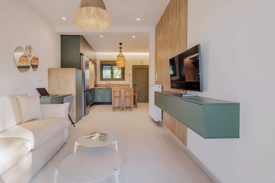 Signature Apartment | Living area | Flat-screen TV