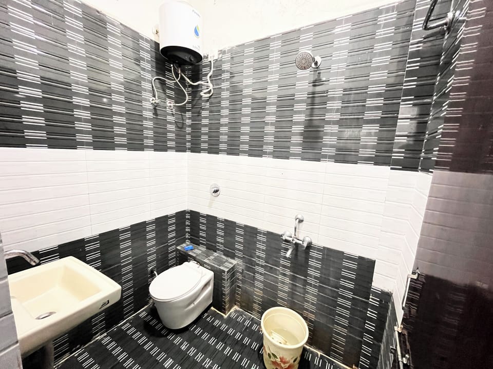 Shower, towels, soap, toilet paper