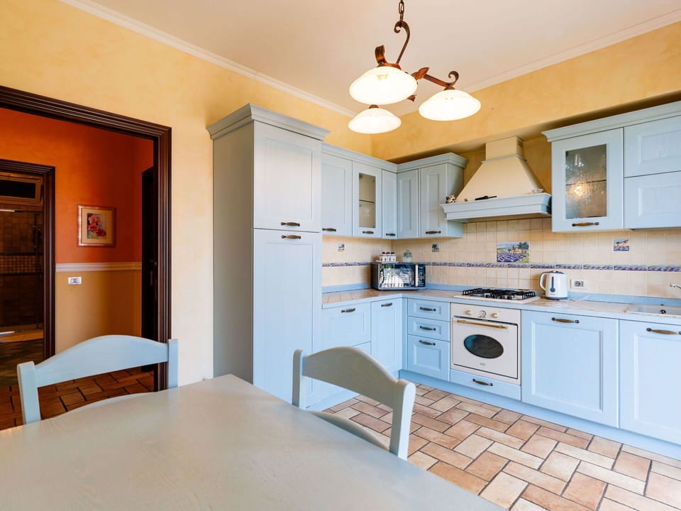 Interior Design, Flooring, Kitchen, Wood, Cabinetry, Furniture, Ceiling, Floor, Countertop, Room