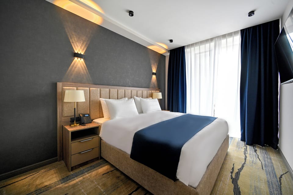 Junior Suite, Mountain View | In-room safe, blackout drapes, soundproofing, iron/ironing board