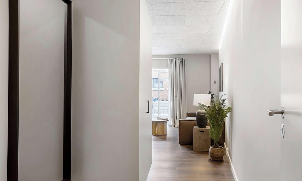 Hallway with full-size mirror