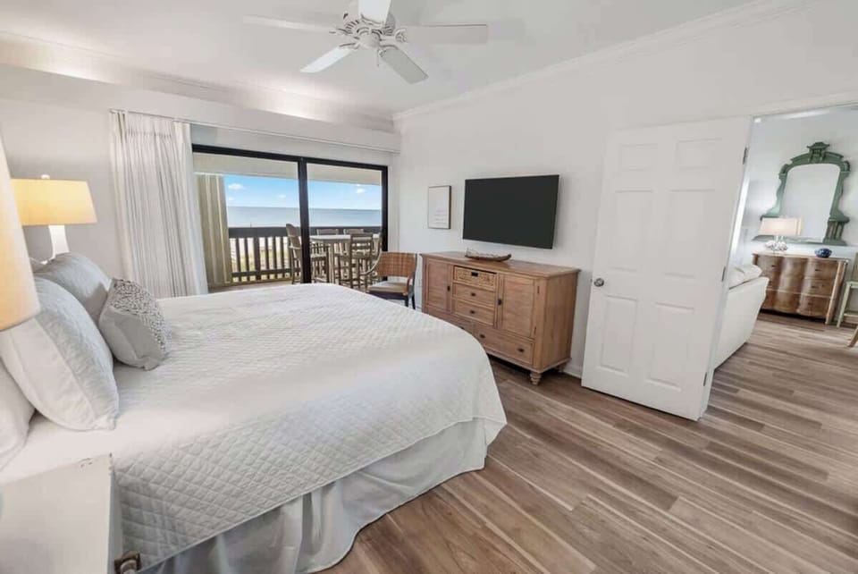 King Master Bedroom #1.  This bed is super comfortable and one of my favorites.  Fan works great and doesn't make noise.  There are black out shades to keep the light out.  