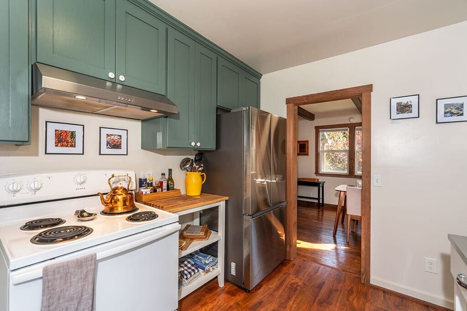 Cooking meals is a simple pleasure in the cheerful kitchen.