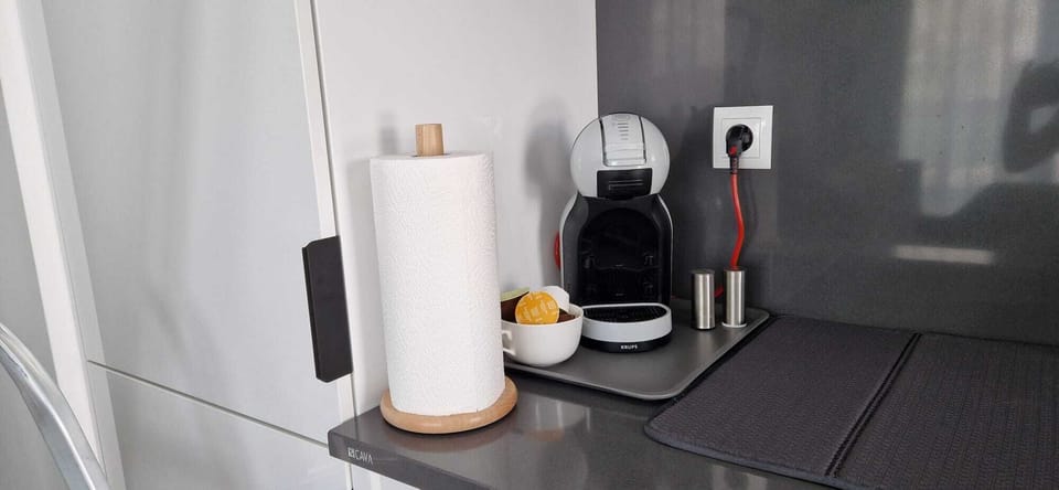 A countertop with a coffee maker