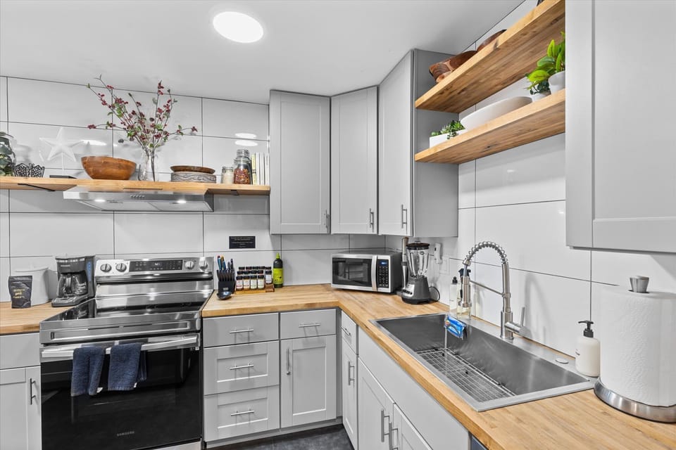 Fully equipped kitchen with stainless steel appliances