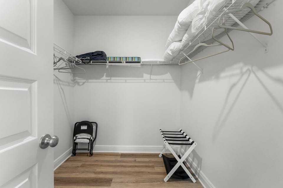 Your private walk-in closet offers ample hanging space and storage for all your vacation wardrobe essentials.