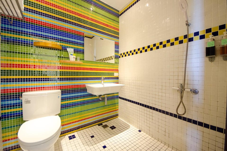 Shower, free toiletries, hair dryer, slippers