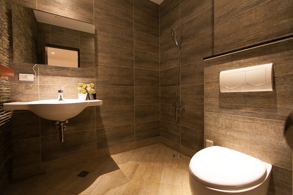 Quadruple Room (Turn Right ) | Bathroom | Shower, free toiletries, hair dryer, slippers