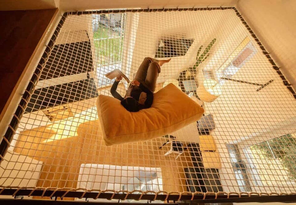 comfortable web above the living room which can be reached through stairs