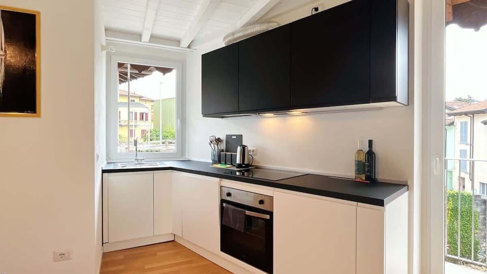 not much spacious but well-equipped, modern and very bright kitchen