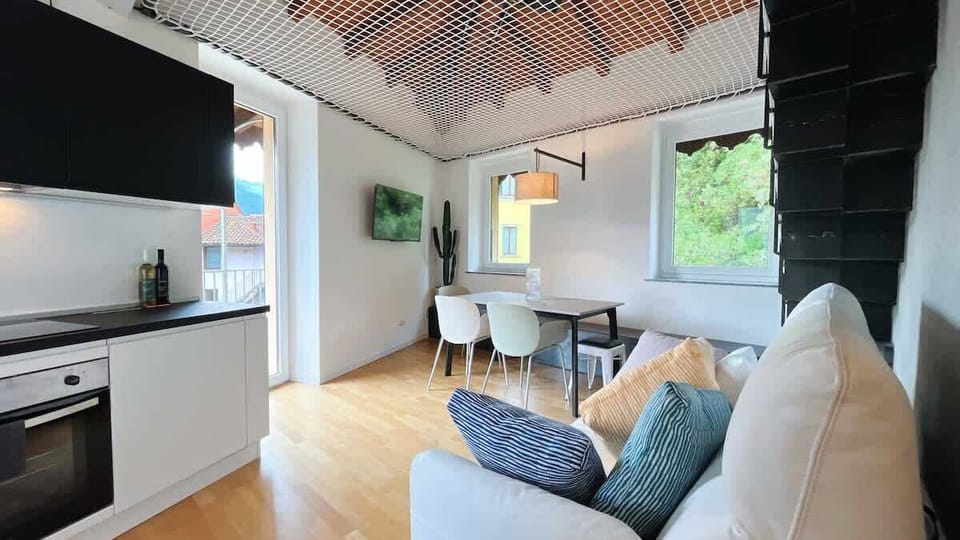 cozy and bright environment that joins living room and kitchen