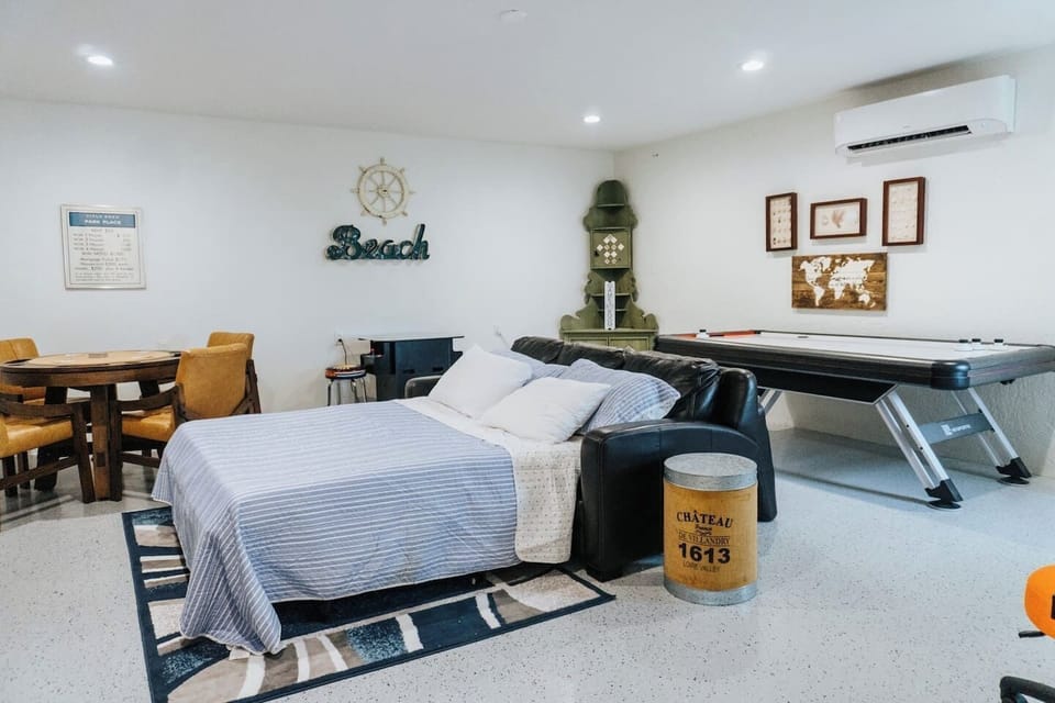 The couch folds out into a queen-size bed, offering comfort during the day and a cozy spot to sleep at night