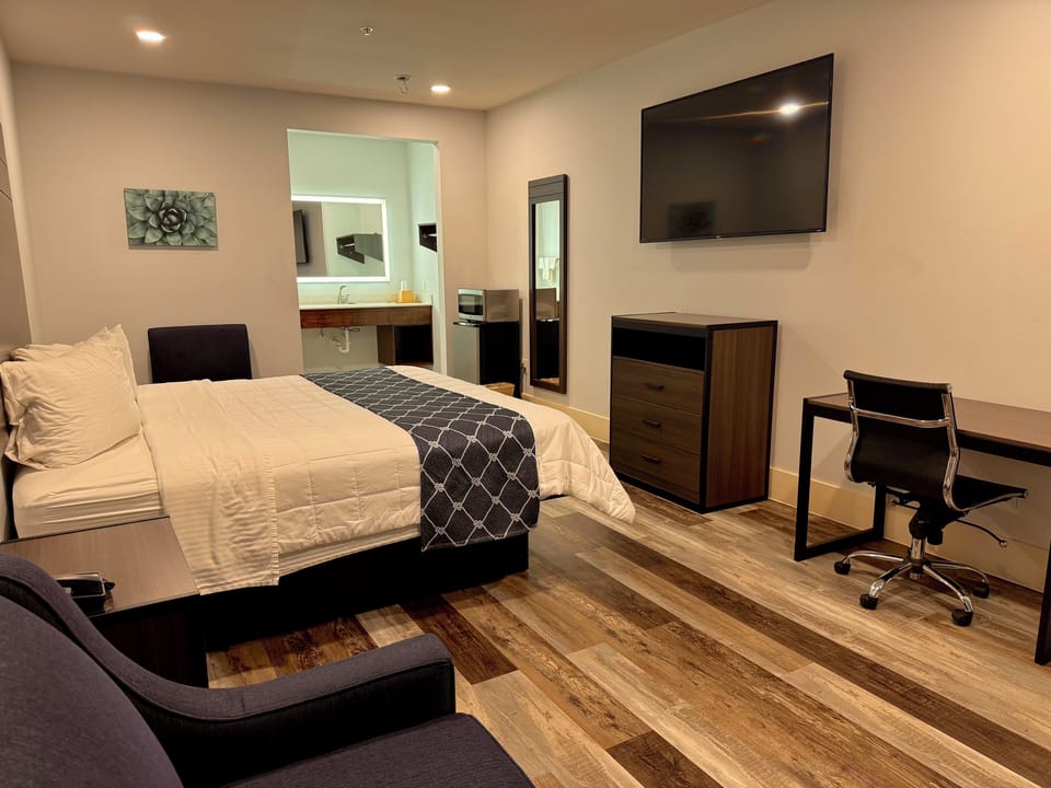 Desk, blackout drapes, iron/ironing board (on request), WiFi (free)