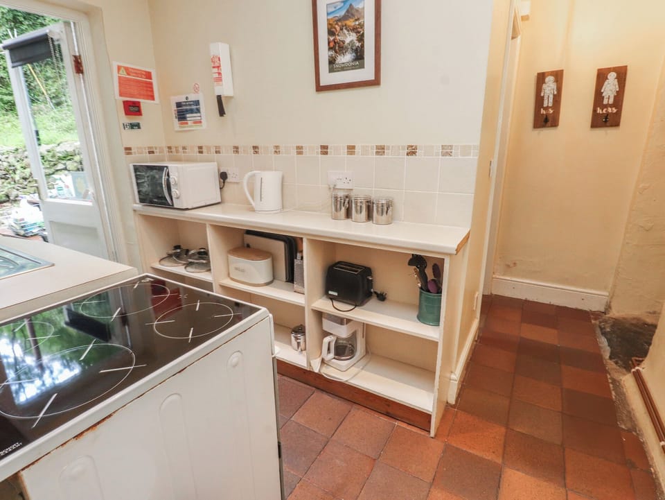 Fridge, microwave, toaster, cookware/dishes/utensils