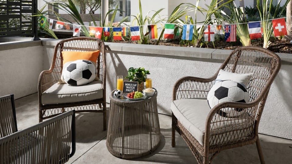 World Cup mornings start best on the terrace — fresh juice, sunshine, and game-day vibes 🍊⚽☀️