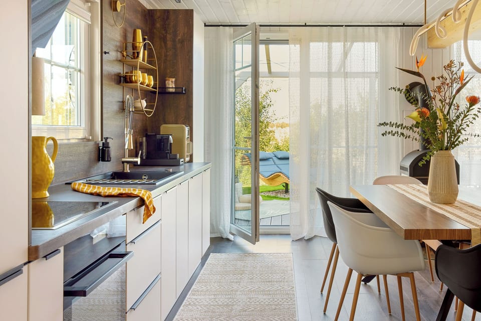 Cook, step out, repeat. The kitchen opens directly onto the garden.