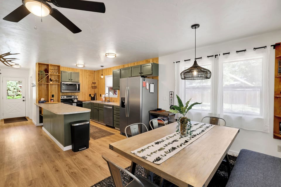 Inviting dining area with cozy seating, perfect for meals and game nights.