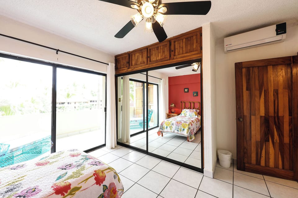 Guest Bedroom Mirrored Closets & Flat Screen TV