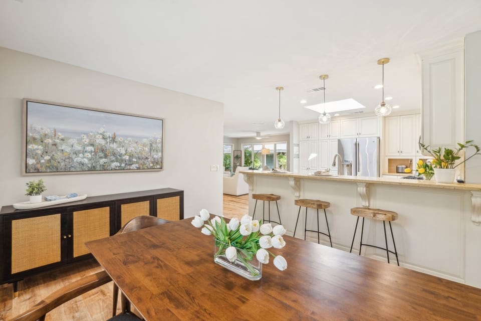 The open layout, natural light, and polished finishes make this the heart of the home.