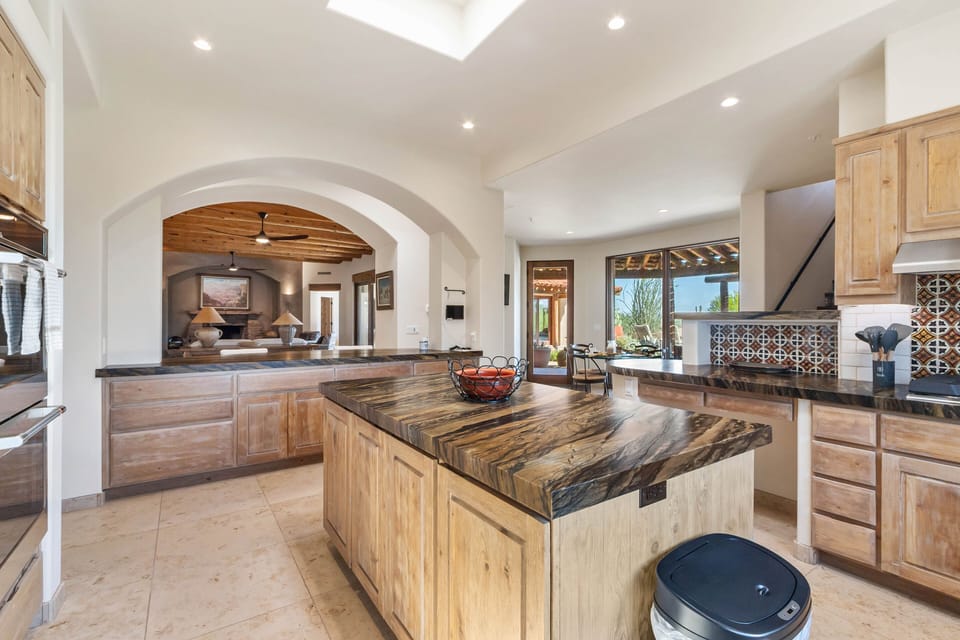 Fully Equipped Kitchen with Double Ovens, Gas Range, & Spacious Island