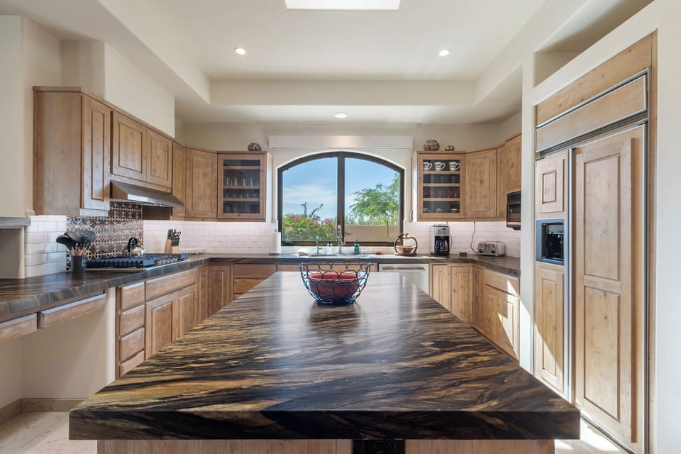 Fully Equipped Kitchen with Double Ovens, Gas Range, Spacious Island, Drip Coffee Maker, & Lots of Natural Light