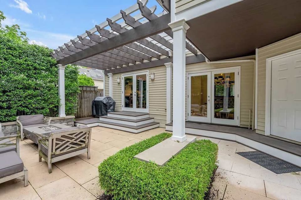 Enjoy the perfect evening outdoors with a warm soak in the hot tub, laughter by the fire pit, and comfortable seating for everyone to gather.