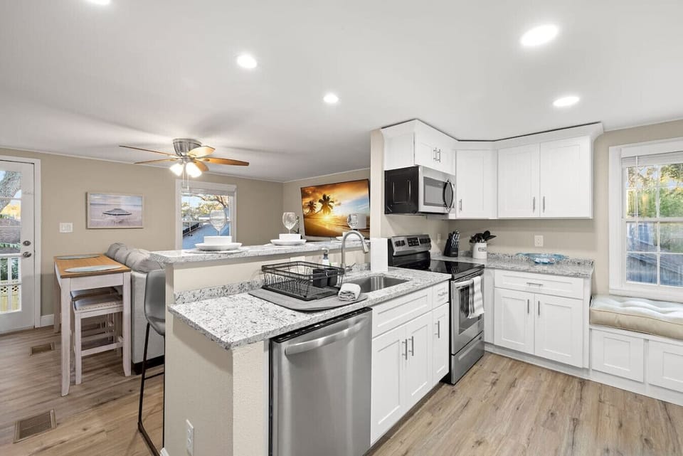 Bright, modern kitchen with everything you need for a comfortable stay—perfect for cooking and socializing.