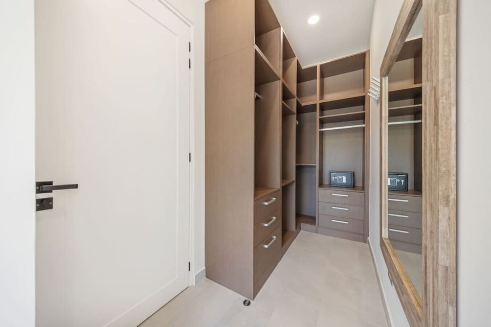 Tucked inside Master Bedroom 1, this walk-in closet gives you all the space you need to stay organized, unpack, and settle in with ease.