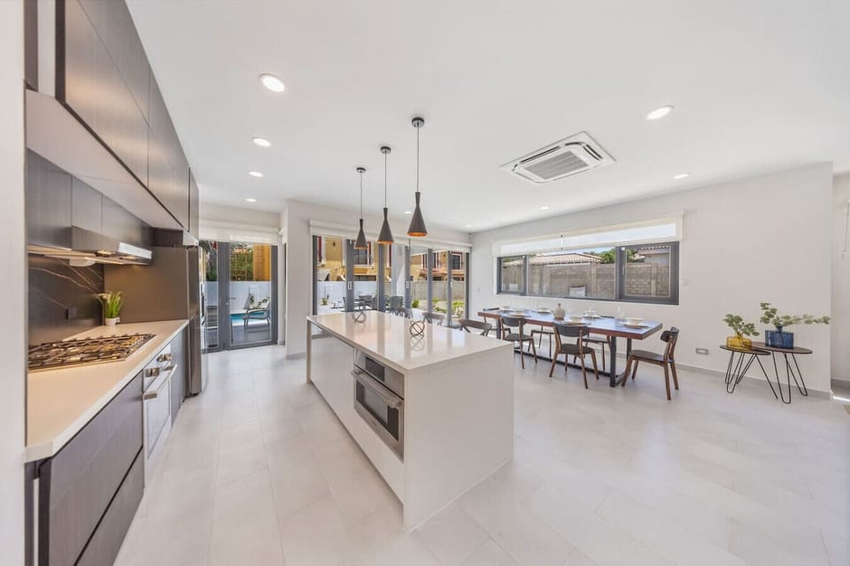 Cook, dine, and connect—all in one bright, open space. This kitchen and dining area is made for memorable meals and good conversation.