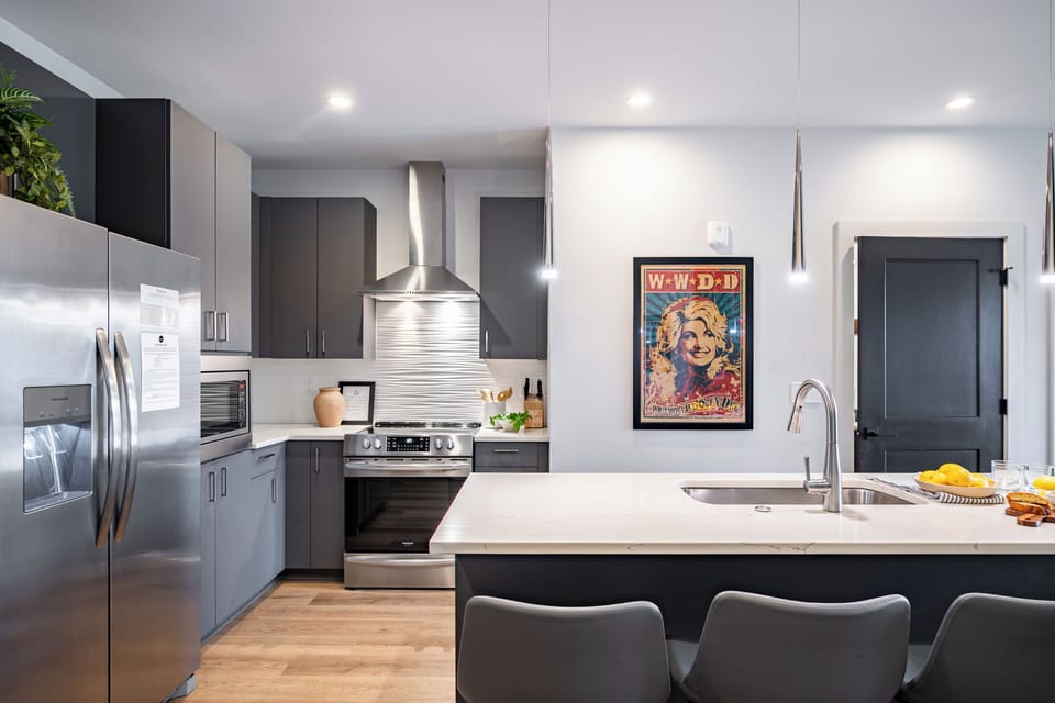 Contemporary kitchen with functional island and open layout.
