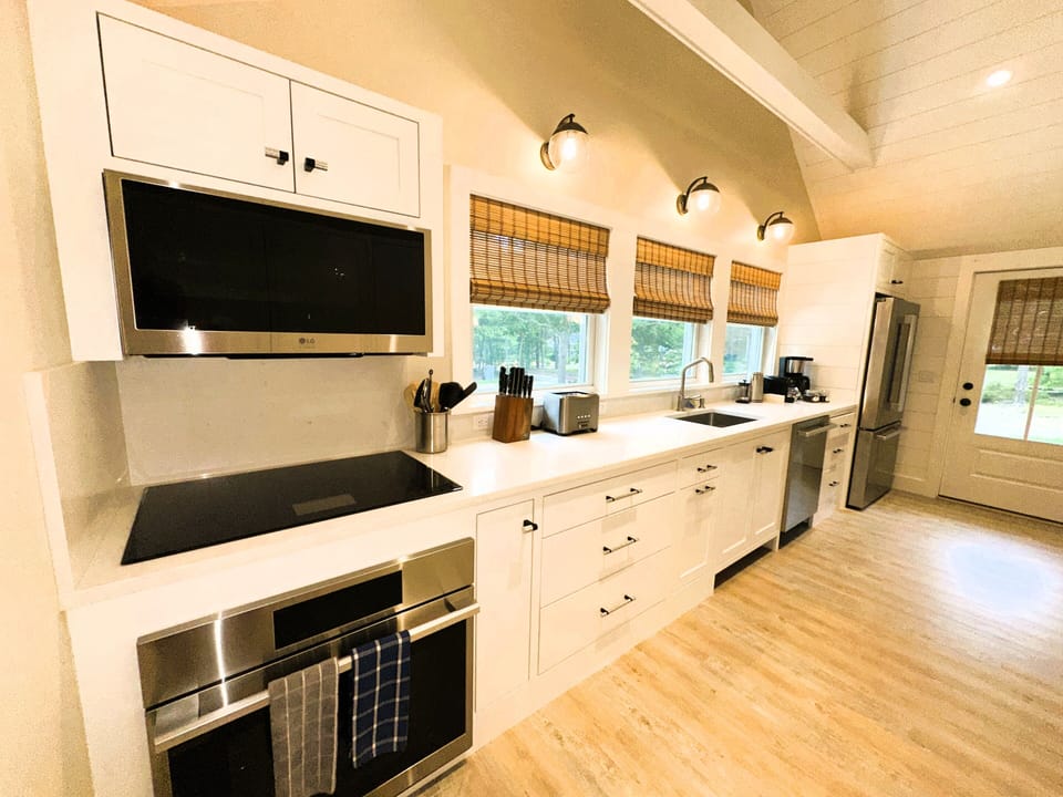 Induction stovetop and oven, top of the line appliances