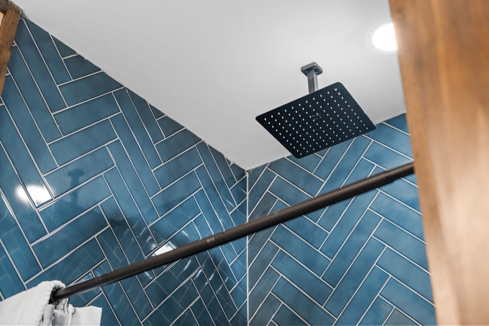 Primary Bath with Luxury Tiled Shower and Rain Shower Head 