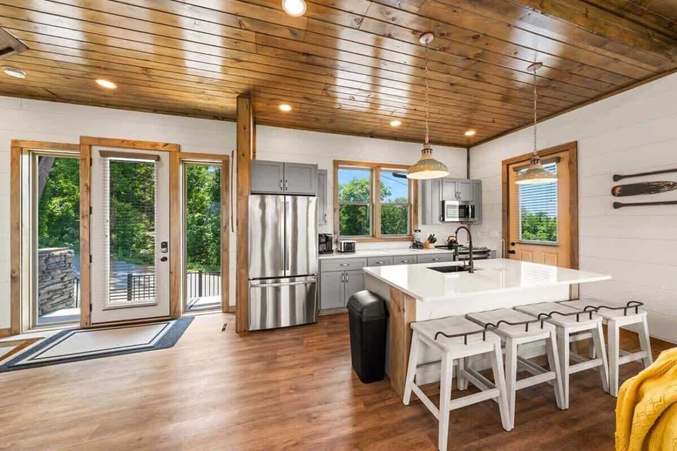Full kitchen is located right inside on the main level. 