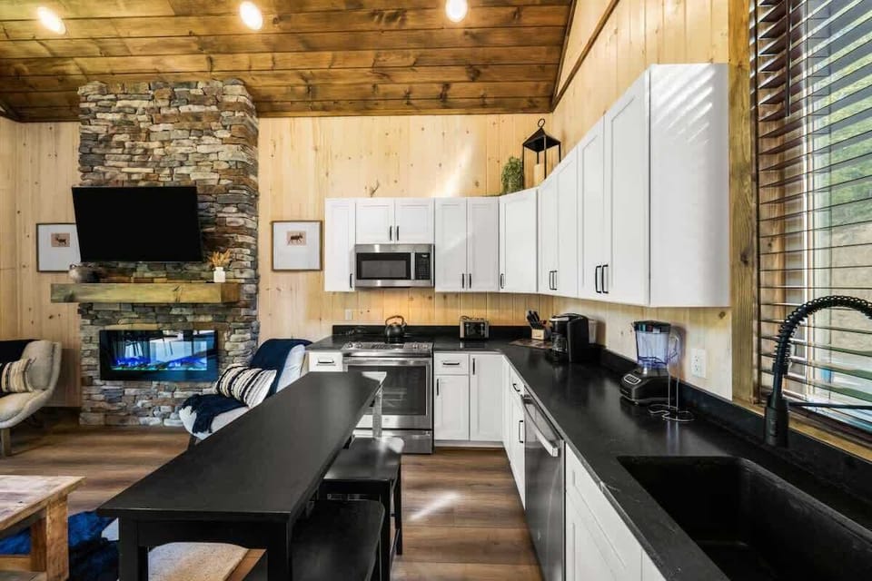 Fully stocked kitchen so you can cook and feed your group during your stay. (stove, oven, microwave, sink (no disposal), fridge, freezer, coffee machine, blender, can opener, toaster, cook/bakeware, silverware, dishes, cups, mugs, and wine glasses.