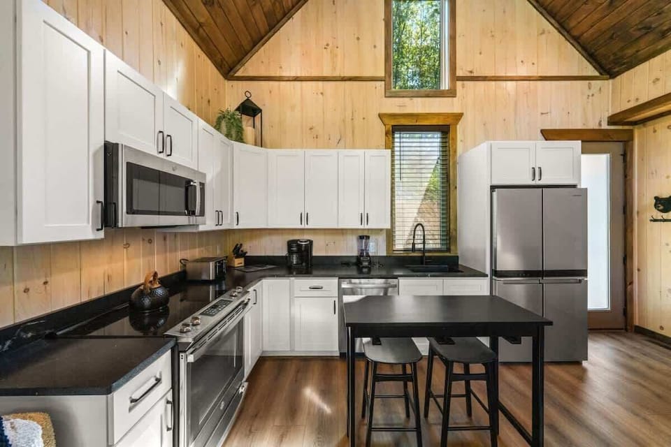 Fully stocked kitchen so you can cook and feed your group during your stay. (stove, oven, microwave, sink (no disposal), fridge, freezer, coffee machine, blender, can opener, toaster, cook/bakeware, silverware, dishes, cups, mugs, and wine glasses.