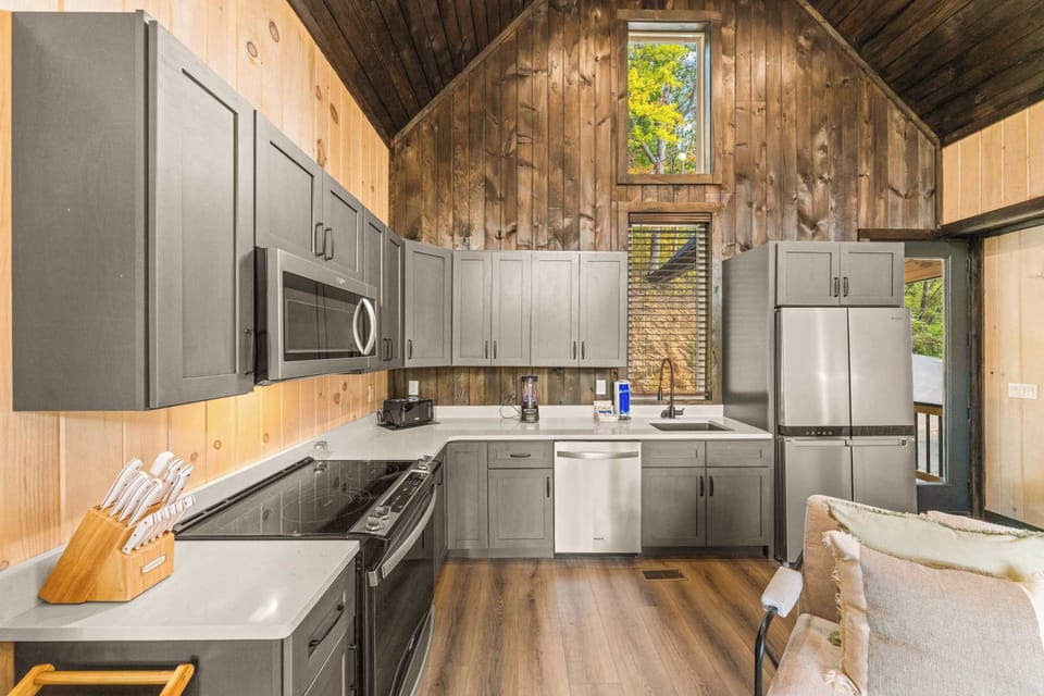Fully stocked kitchen so you can cook and feed your group during your stay. (stove, oven, microwave, sink (no disposal), fridge, freezer, coffee machine, blender, can opener, toaster, cook/bakeware, silverware, dishes, cups, mugs, and wine glasses.